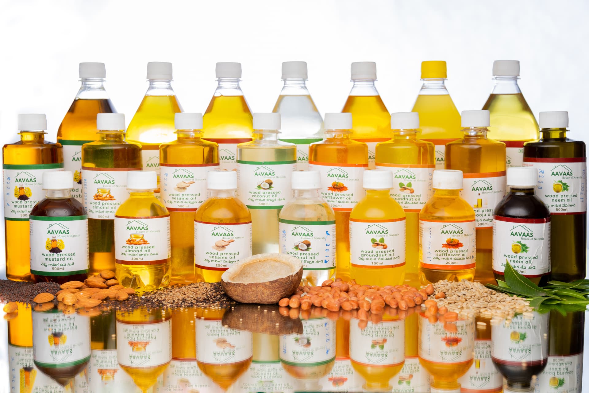AAVAAS wood-pressed oil bottles — groundnut, coconut and sesame